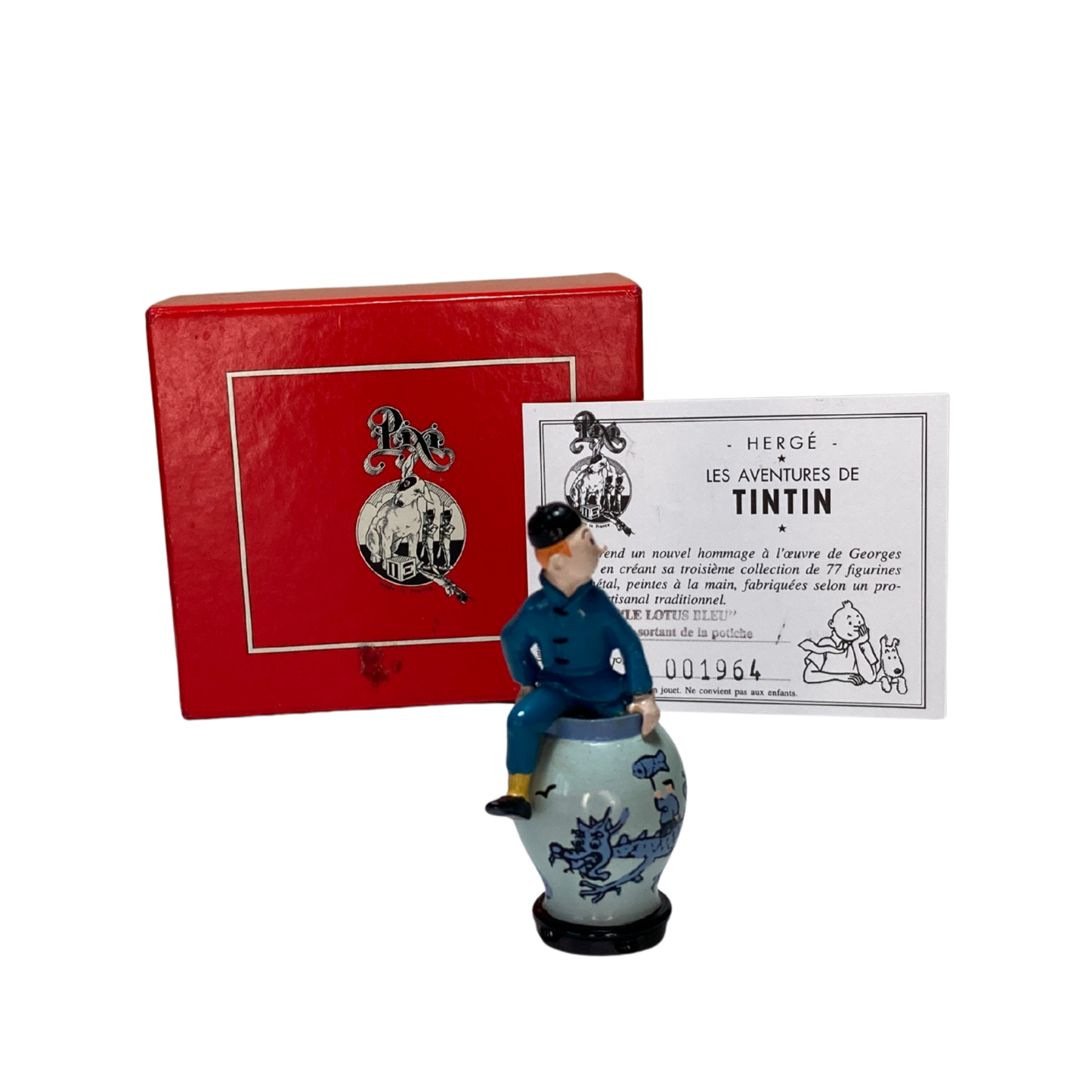 Tintin sortant de la potiche en céramique, décoration originale de la marque Espace714, visible en détail dans l'image.