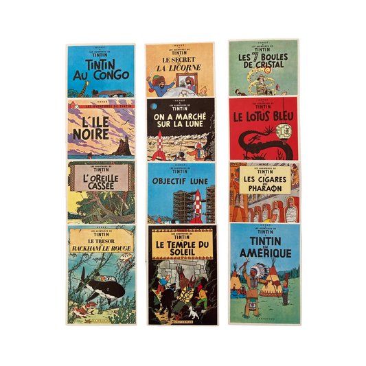 12 cartes postales illustrées des couvertures des albums des Aventures de Tintin, collection Espace714, format standard.