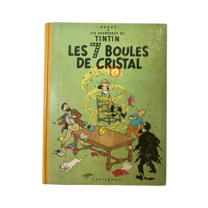 Page de couverture du livre "Les Aventures de Tintin: Les 7 boules de cristal" d'Hergé, édition Espace714, illustrée avec Tintin et le professeur.