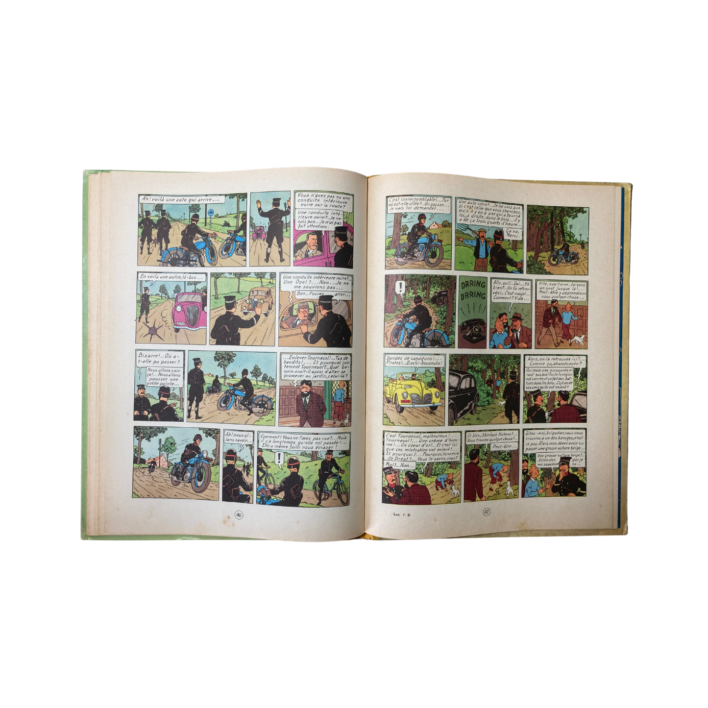 Page de couverture du livre "Les Aventures de Tintin : Les 7 boules de cristal" par Hergé, illustré avec couleurs vives.