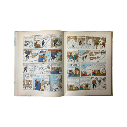 Livre Tintin au Tibet par Hergé, couverture illustrée avec Tintin et le chien Milou, édition Espace714.