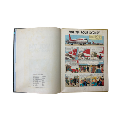 Page de couverture du livre Les Aventures de Tintin par Hergé, volume 714 pour Sydney, édition Espace714, illustrée avec Tintin et le avion.
