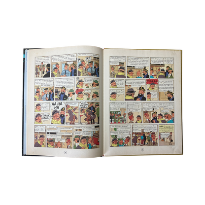 Couverture du livre Les Aventures de Tintin par Hergé, volume 714 pour Sydney, publié par Espace714, illustrée avec Tintin et le chien Milou.