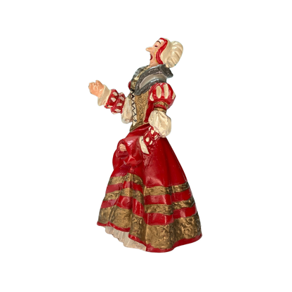 Femme portant une robe La Castafiore en marguerite d'Espace714, vêtement élégant avec motif floral coloré.