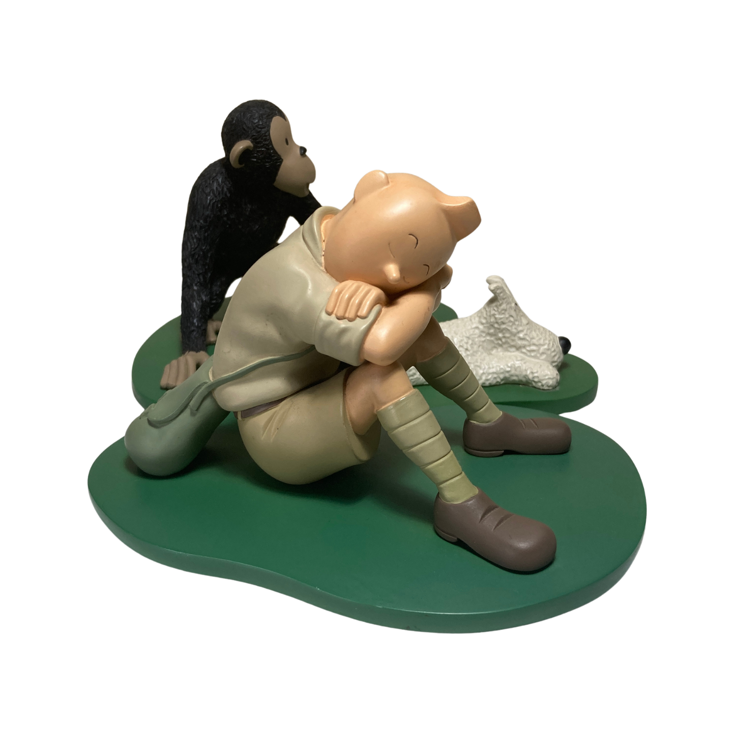 Diorama Tintin dormant, figurines détaillées dans une scène de style Diorama, représentant Tintin endormi avec Haddock et Milou.