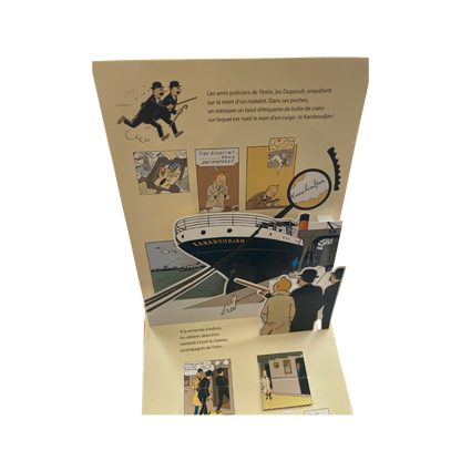 Album de Tintin "Le Crabe aux Pinces d'Or" de Hergé, édition 2010, illustré avec la couverture du livre.