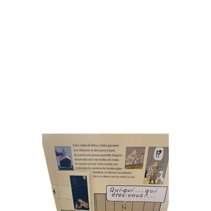 Album de Tintin de Hergé, « Le crabe aux pinces d’or », édition pop hop de 2010 avec couverture colorée et illustrations détaillées.