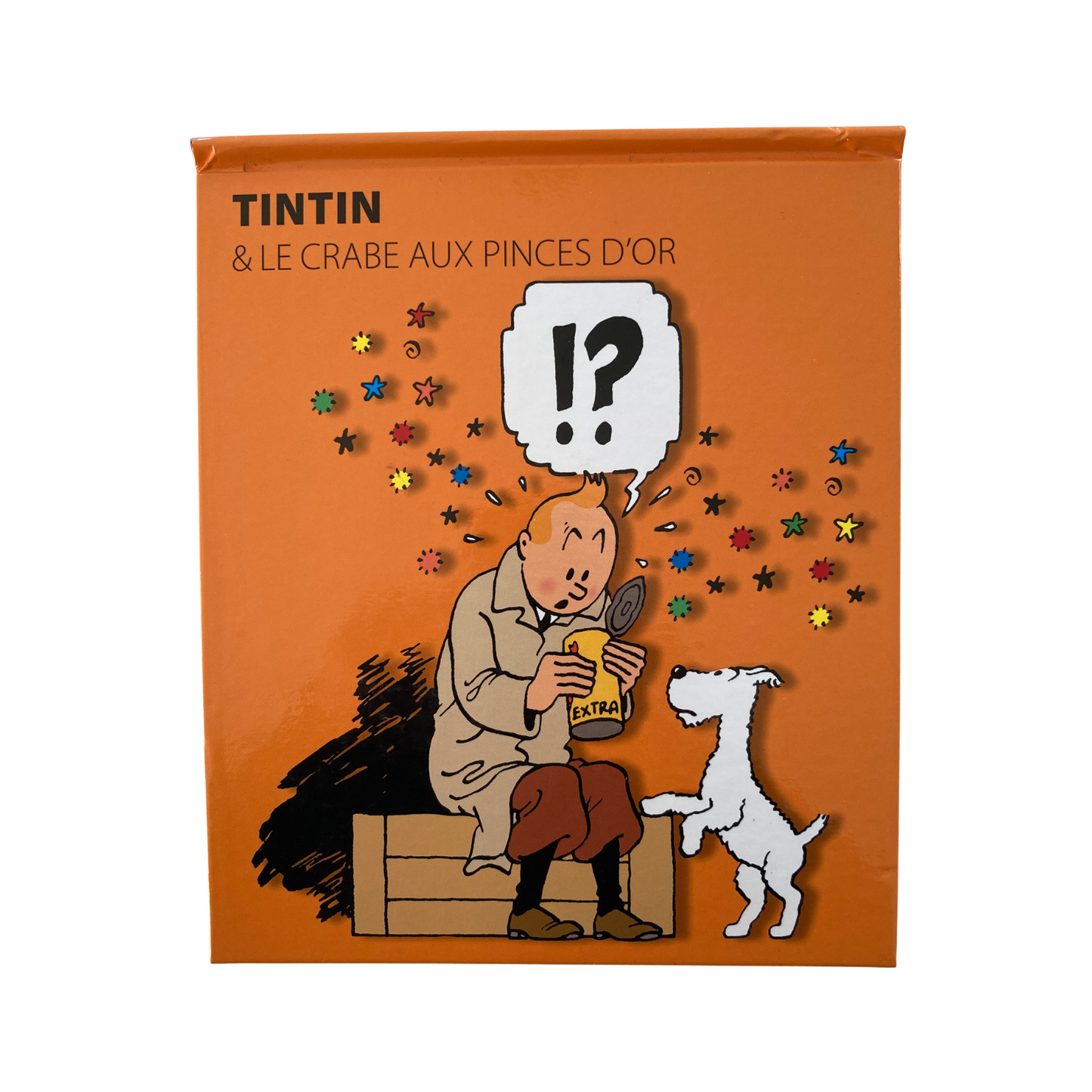 Album de Tintin "Le crabe aux pinces d'or" de Hergé, édition pop hop de 2010, avec couverture colorée et illustrations détaillées.