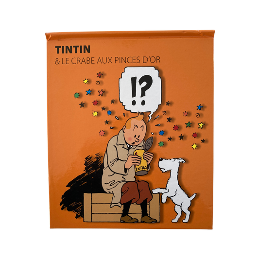 Album de Tintin "Le crabe aux pinces d'or" de Hergé, édition pop hop de 2010, avec couverture colorée et illustrations détaillées.