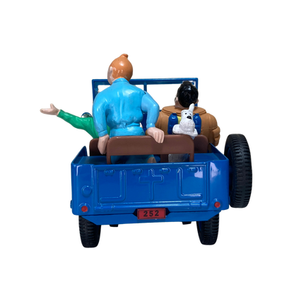 Jeep bleue Espace714 avec détails visibles, vue de face montrant la carrosserie et les roues du véhicule.