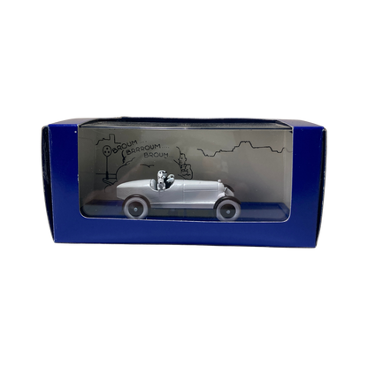 Voiture miniature L’Amilcar Espace714, modèle ancien en métal avec roues noires et détails vintage.