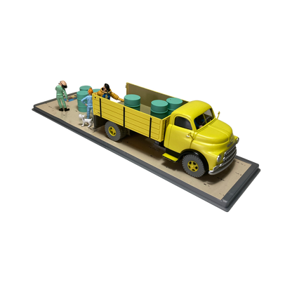 Camion jaune de la base Espace714, vue de côté avec détails colorés et roues visibles, pour enfants ou collection.