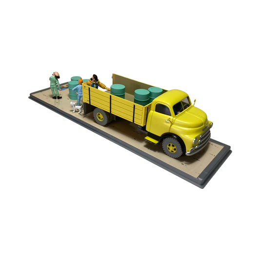 Camion jaune de la base Espace714, vue de côté avec détails colorés et roues visibles, pour enfants ou collection.