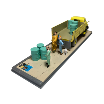 Camion jaune de la base Espace714 avec détails colorés, vue de côté montrant le véhicule enfant en plastique.