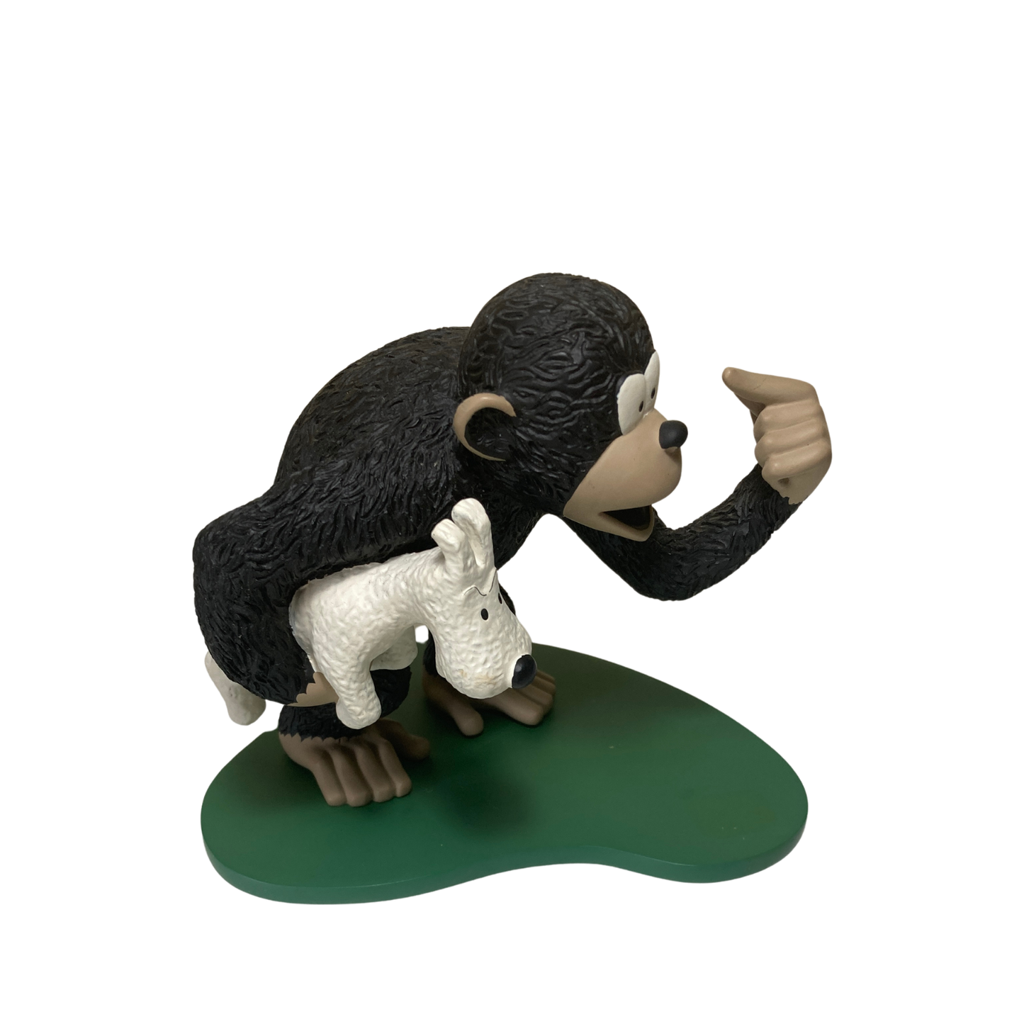 Singe Congo portant Milou en peluche, décor coloré, illustrant une scène ludique, fabriqué par Espace714.