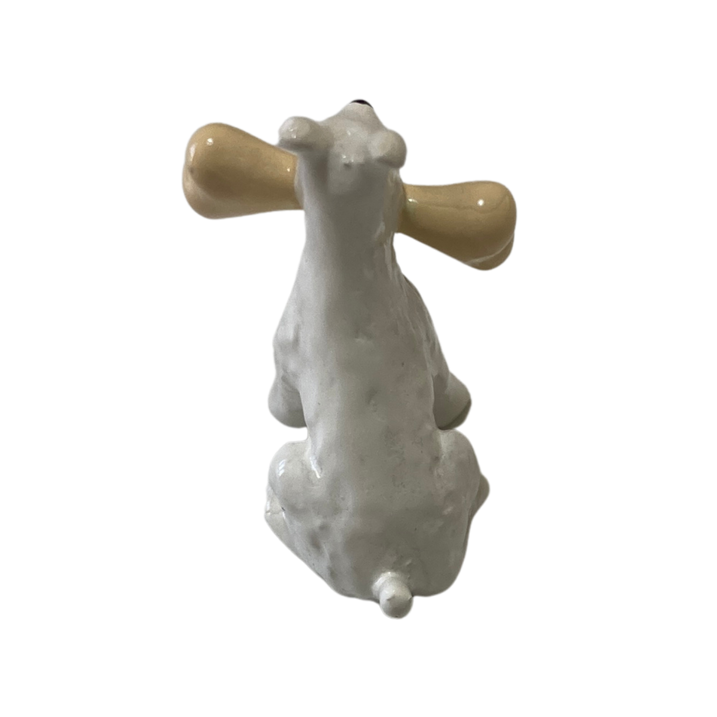 Milou os de Espace714, coussin en forme de chien avec visage souriant et oreilles en tissu beige, décoration douce et amusante.