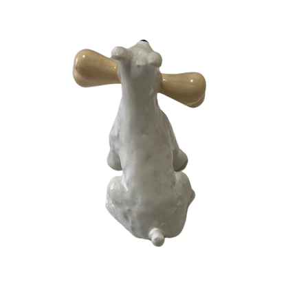 Milou os de Espace714, coussin en forme de chien avec visage souriant et oreilles en tissu beige, décoration douce et amusante.