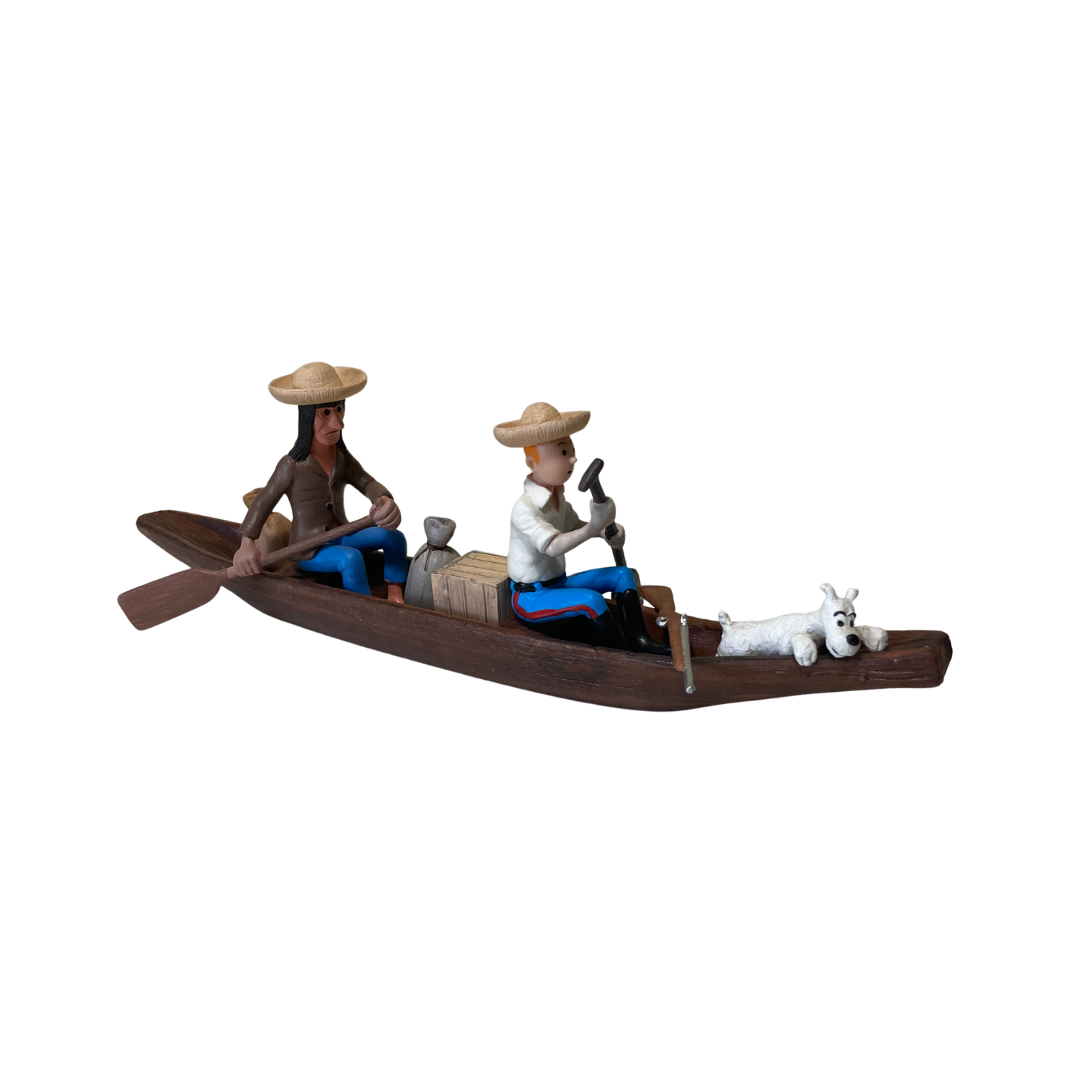 Pirogue Tintin, l’Indien et Milou en figurines colorées, illustrant la scène emblématique de la bande dessinée.