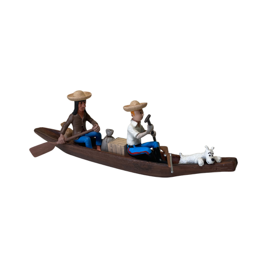 Pirogue Tintin, l’Indien et Milou en figurines colorées, illustrant la scène emblématique de la bande dessinée.