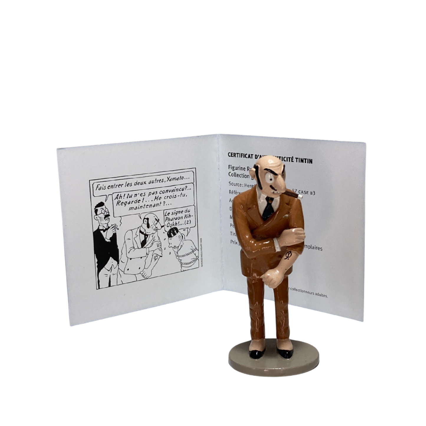 Figure de Rastapopoulos en carton représentant le personnage de la bande dessinée, détaillée avec vêtements et accessoires.