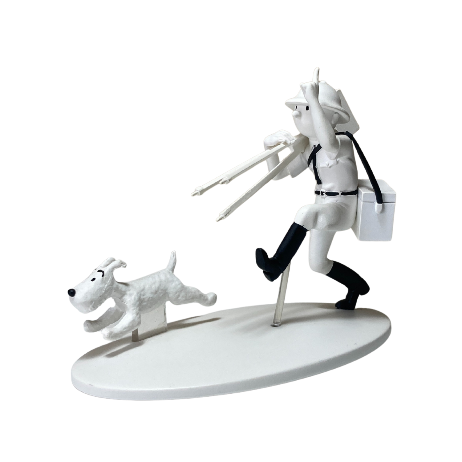 Image de Tintin cinéaste et Milou au Congo, figurines détaillées de la collection Espace714, représentant une scène d'aventure.