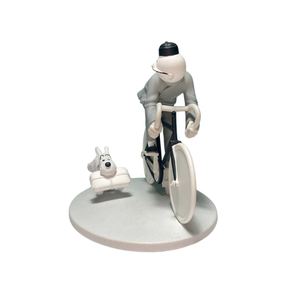 Image de Tintin cycliste avec Milou à Shanghai, illustrant une scène colorée et dynamique, pour le produit Tintin Cycliste et Milou.