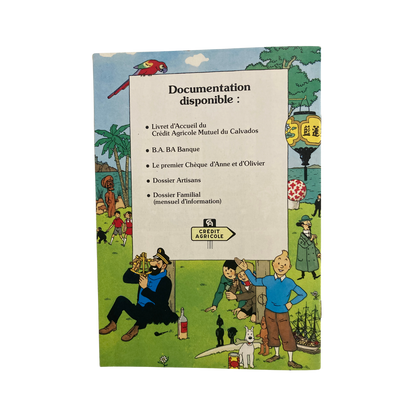 Image de Tintin dans la bande dessinée "Au Crédit Agricole" de 1980, publié par Espace714, illustrant une scène de la série Tintin.