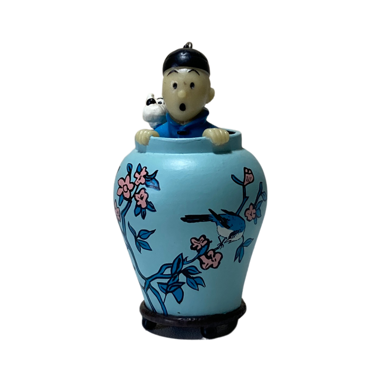 Porte-clé Tintin et Milou dans une potiche, illustré par Hergé, en métal avec détail coloré, pour collection ou décoration.