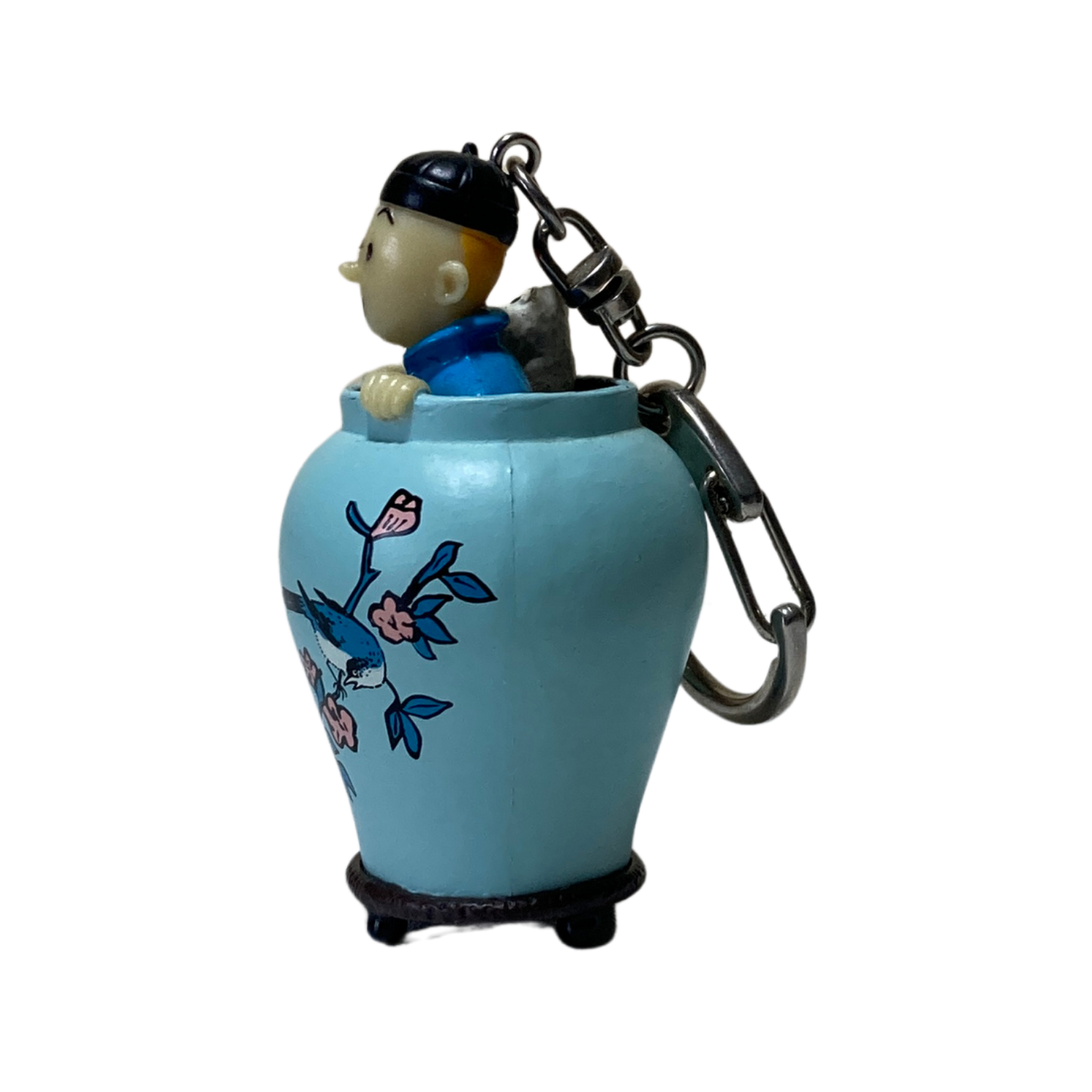 Porte-clés Tintin et Milou dans une potiche, illustration de Hergé, miniature détachable, accessoire de collection.