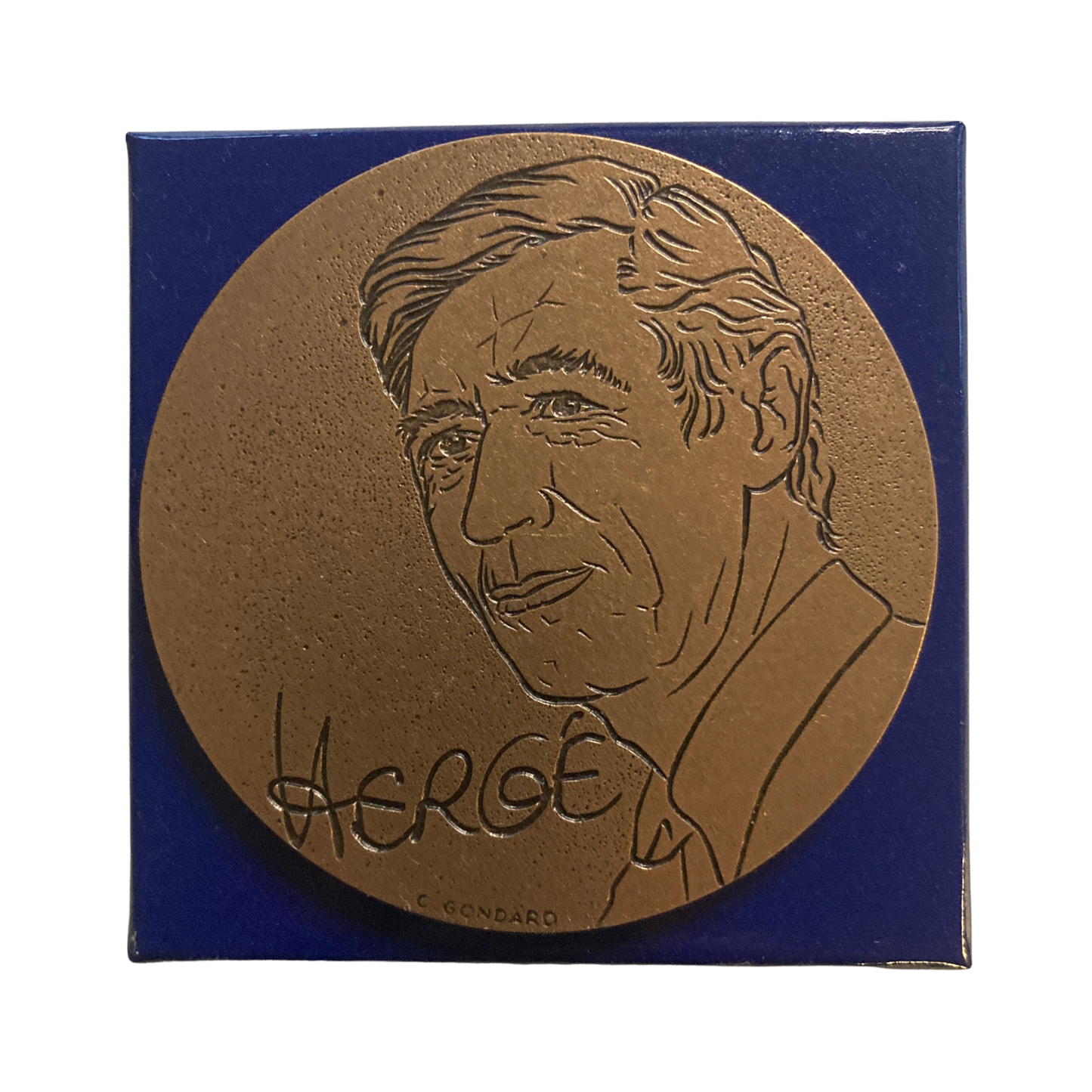 Pièce de monnaie Tintin Hergé Monnaie de Paris, illustrant les aventures de Tintin en relief, avec détails artistiques.