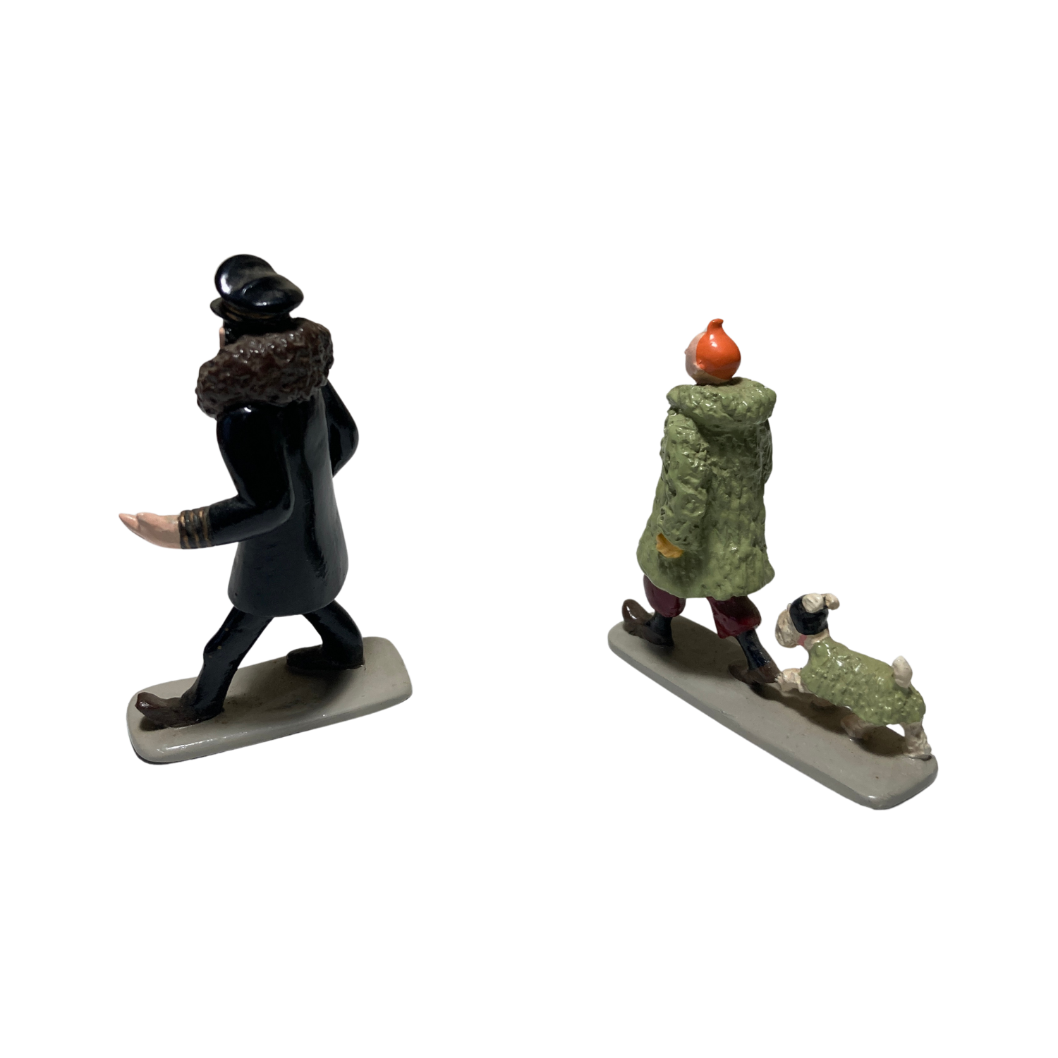 Image de Tintin, Milou et le capitaine Haddock, personnages de la série de bandes dessinées Tintin, en illustration colorée.