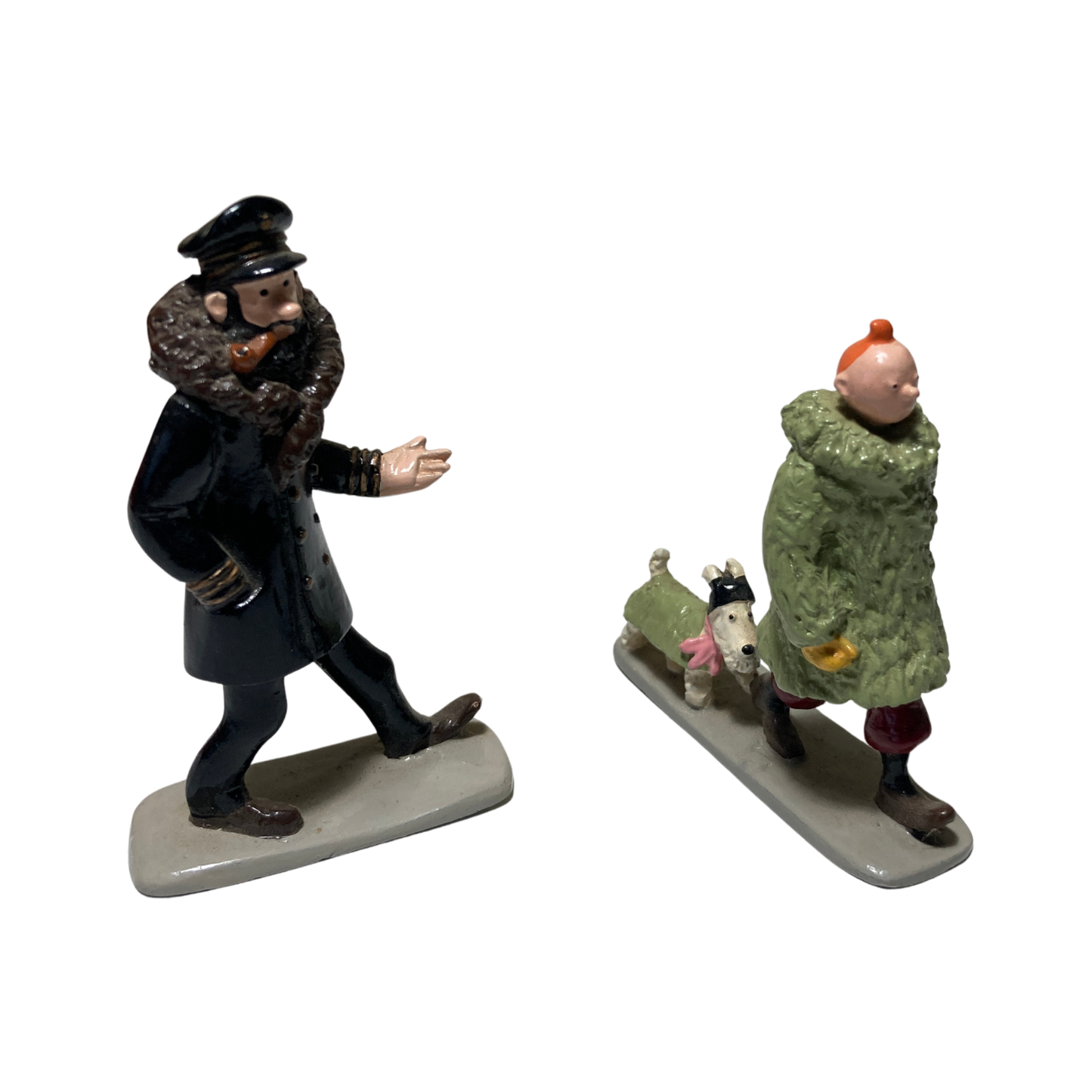 Figurines de Tintin, Milou et Haddock en figurine en plastique, collection Espace714, détails colorés et expressifs.