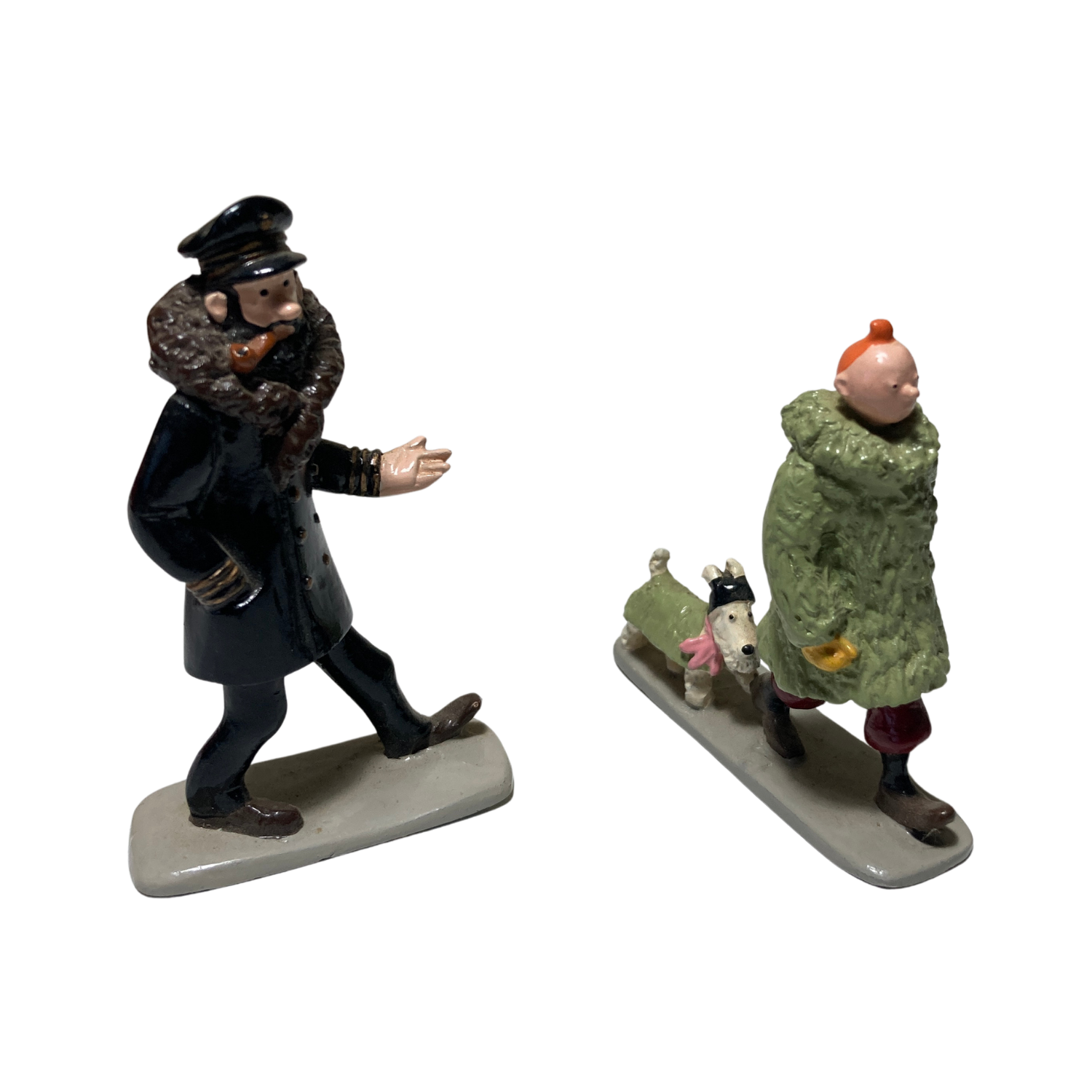 Figurines de Tintin, Milou et Haddock en figurine en plastique, collection Espace714, détails colorés et expressifs.