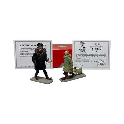 Figurines Tintin, Milou et Haddock en résine de la marque Espace714, représentant les personnages emblématiques de la bande dessinée.