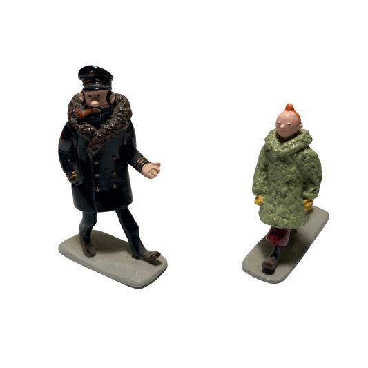 Image de Tintin, Milou et Haddock, personnages de la bande dessinée, en illustration colorée.