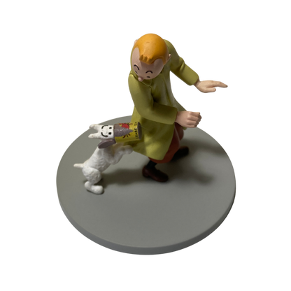 Illustration de Tintin, Milou et la boîte de crabe, illustration colorée d'une scène de bande dessinée.