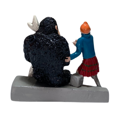 Illustration de Tintin, Milou et le gorille, tirée d'une œuvre de la collection Espace714, montrant les personnages en action.