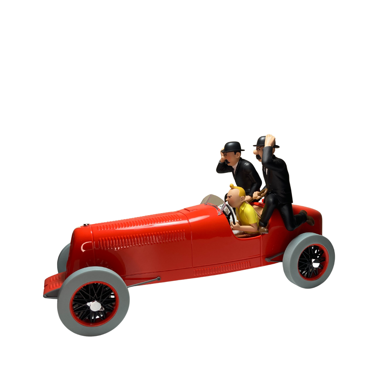 Figurine de Tintin avec les Dupondt et le bolide rouge, modèle de la collection Espace714, vue en gros plan.