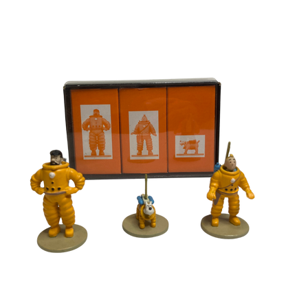 Coffret Tintin Lune par Espace714 avec illustrations de Tintin explorant la lune, comprenant plusieurs albums et objets liés à l'espace.