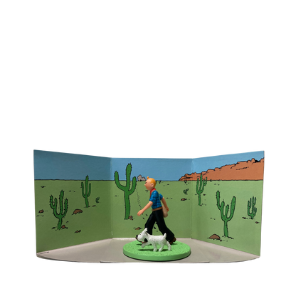 Figurine Tintin cowboy avec Milou, personnage de la bande dessinée, en détail, illustrant la scène avec précision.