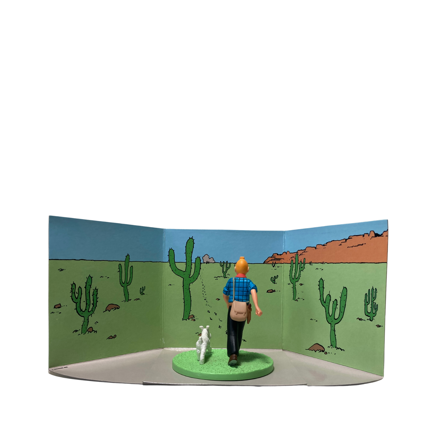 Figure de Tintin en cowboy avec Milou, figurine de collection de Espace714, en pose dynamique et détaillée.