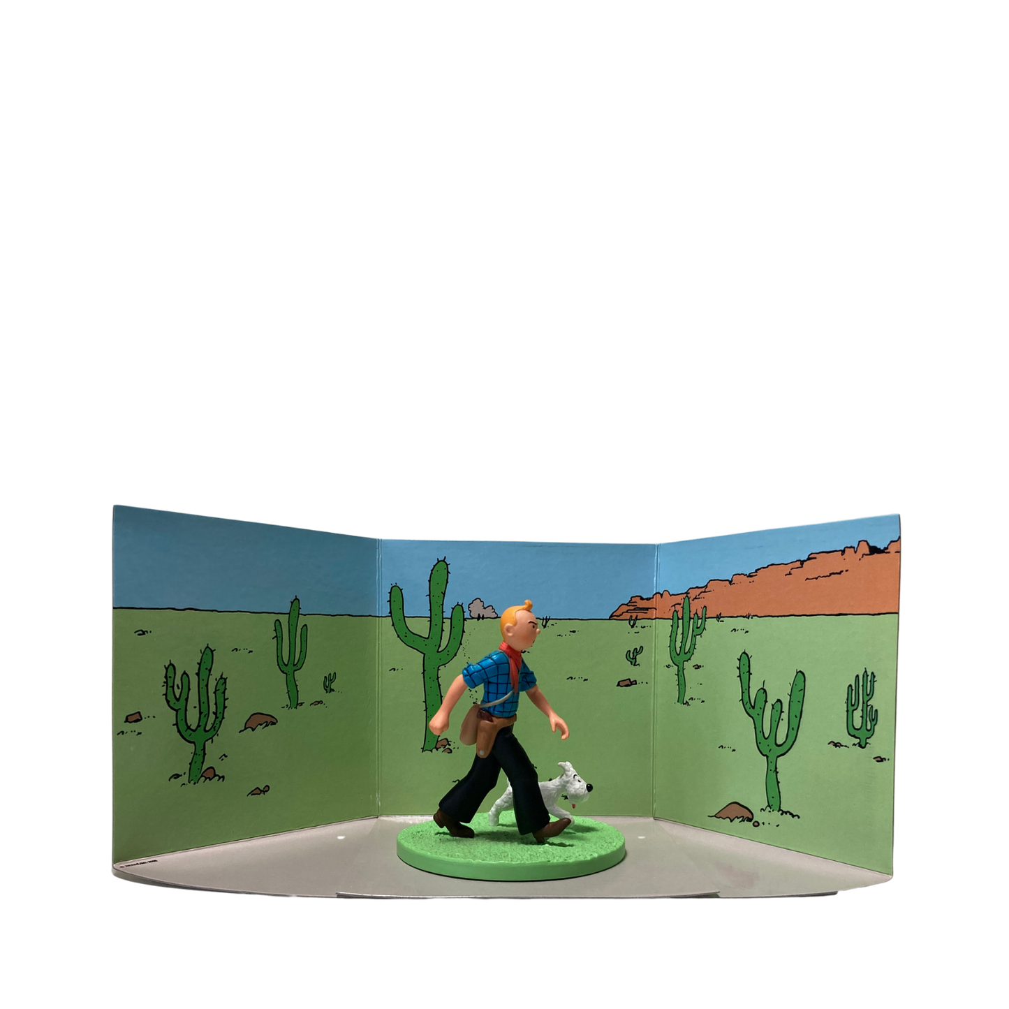 Figure de Tintin cow-boy avec Milou, collection Espace714, illustration de bande dessinée, personnages en posture dynamique.