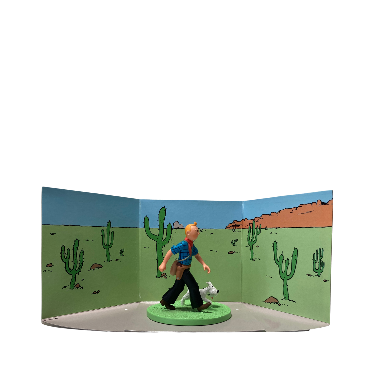 Figure de Tintin cow-boy avec Milou, collection Espace714, illustration de bande dessinée, personnages en posture dynamique.