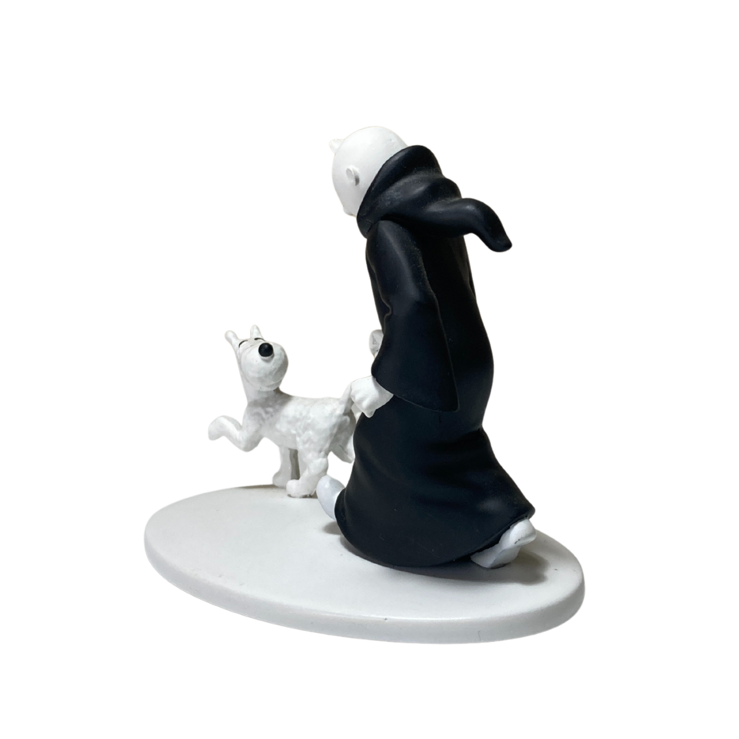 Figurine Tintin en toge avec Milou dans un décor indien, figurine de collection Espace714, détails colorés et expressifs.