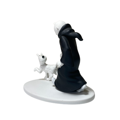 Figurine Tintin en toge avec Milou dans un décor indien, figurine de collection Espace714, détails colorés et expressifs.