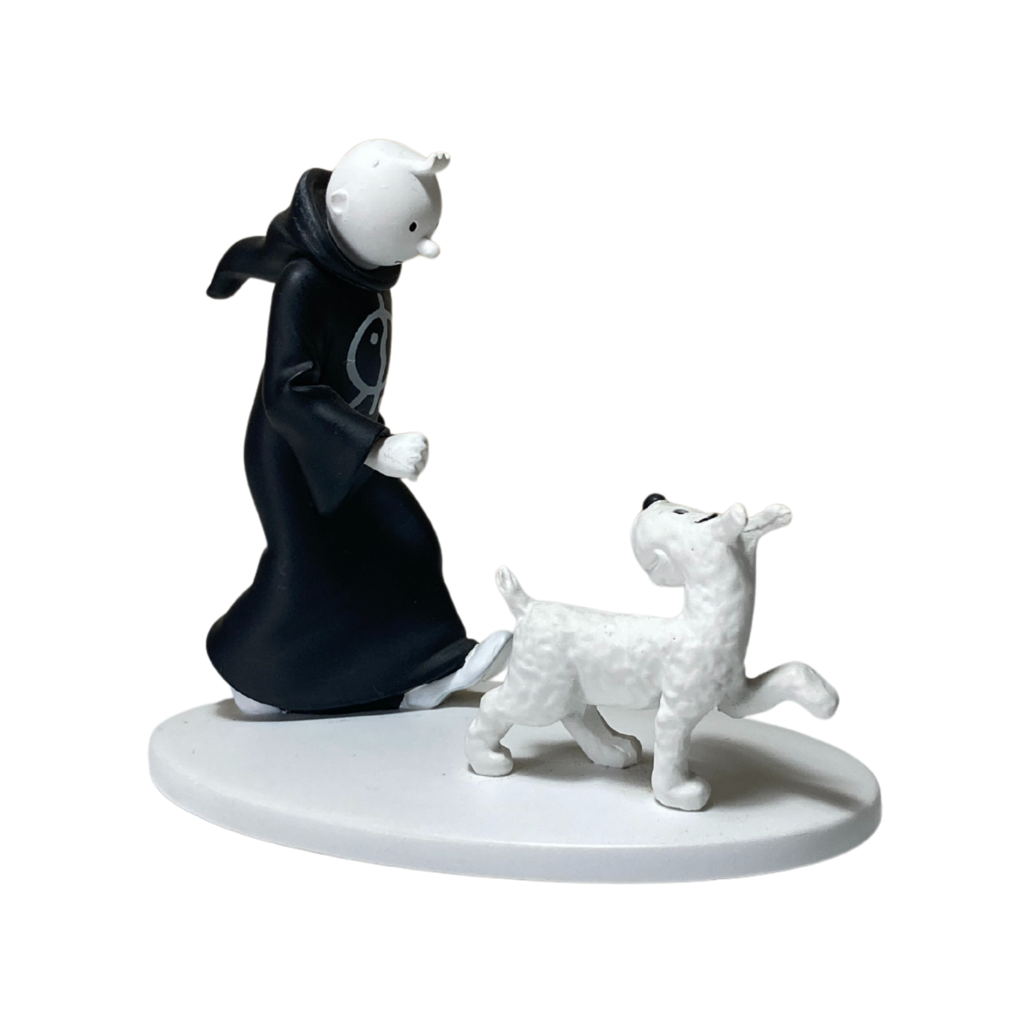 Figure de Tintin en toge avec Milou dans un décor indien, illustration colorée de la bande dessinée Tintin en Toge et Milou en Inde.