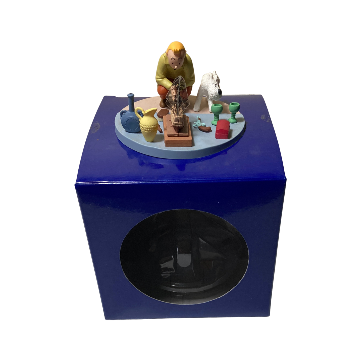 Figurine Tintin et Milou au marché aux puces, collection Espace714, figurine détaillée de Tintin et son chien Milou.