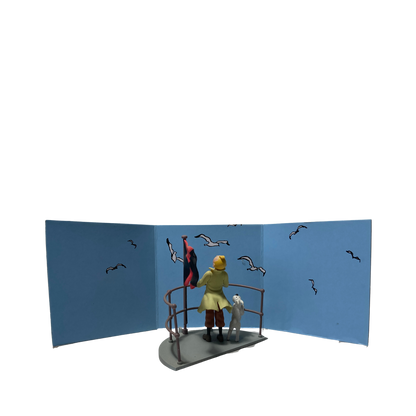 Image de Tintin et Milou sur l’Aurore, figurines de collection de la série Tintin par Espace714, illustrant une scène d’aventure.