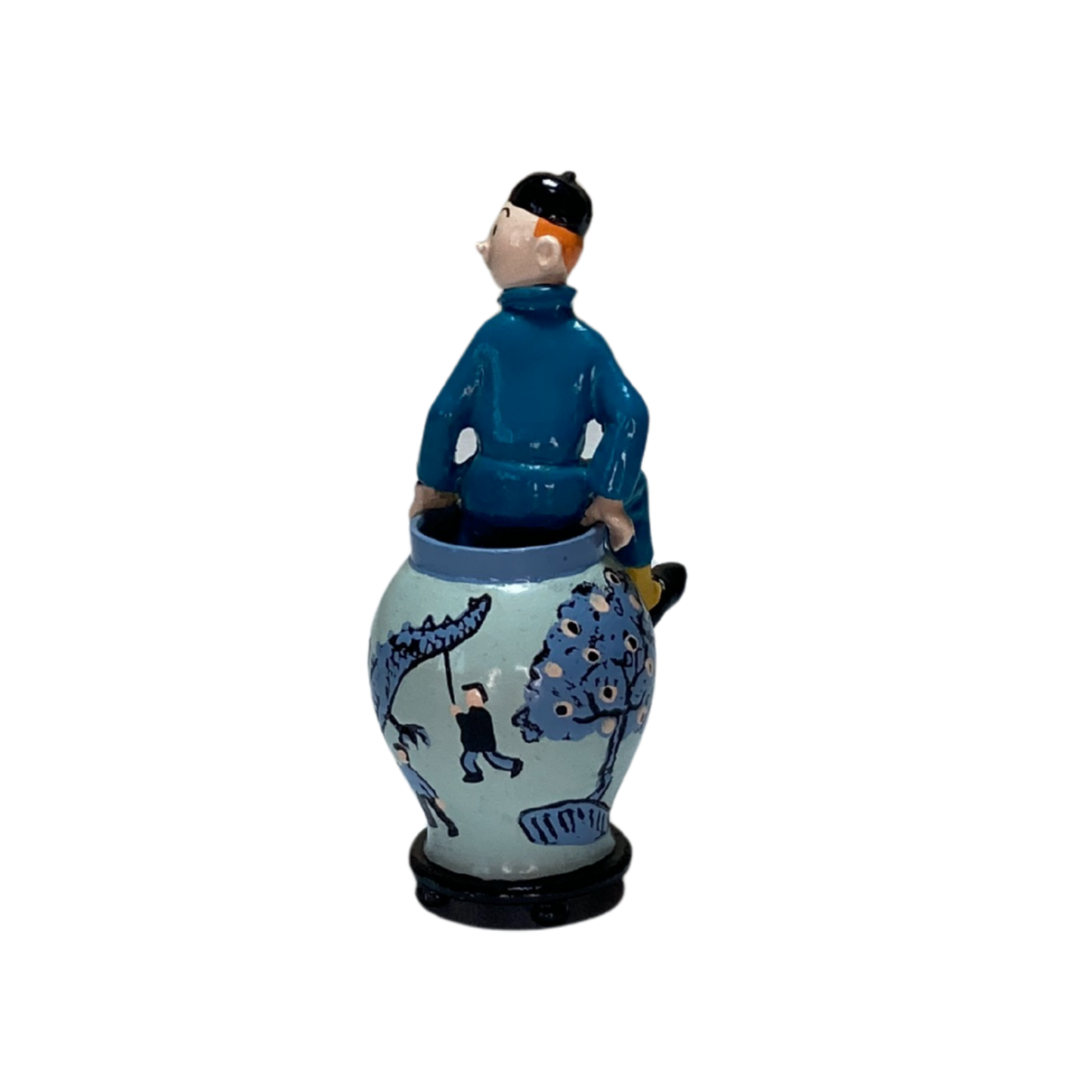 Statue de Tintin sortant d'une potiche en céramique, modèle de la marque Espace714, détail coloré et sculpté.