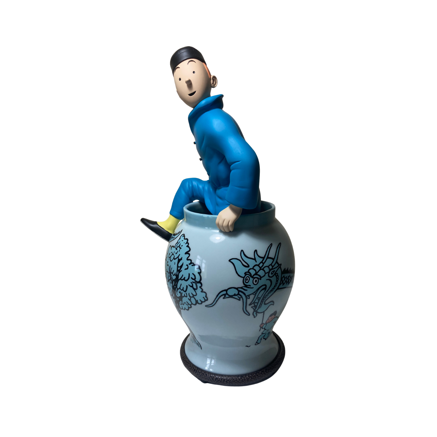 Statue de Tintin sortant d'une potiche en résine de la marque Espace714, détail coloré et figurine de collection.